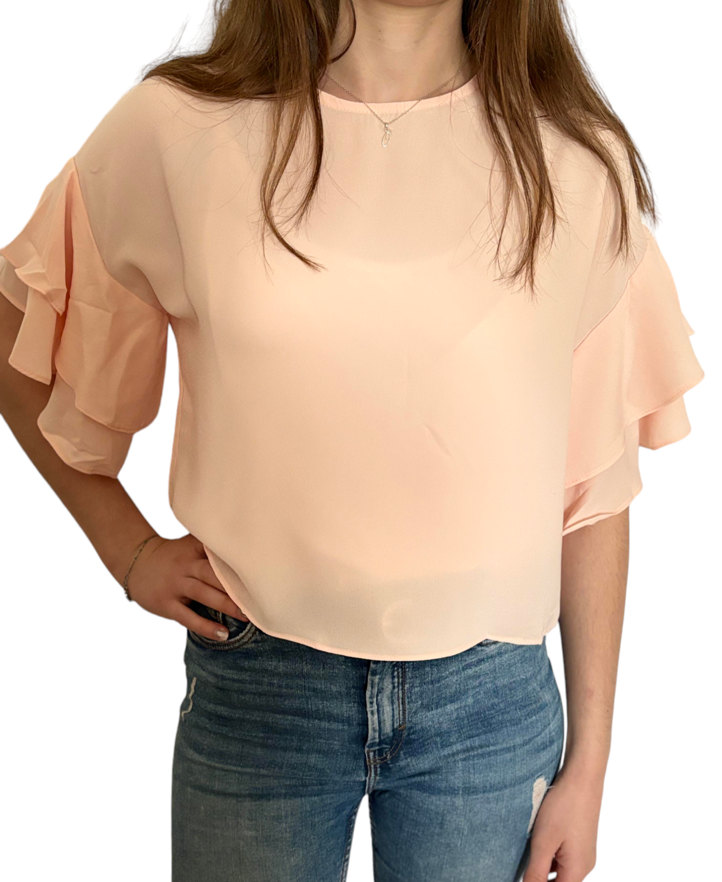 Blouse rose avec volants aux manches